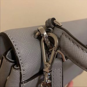 MK crossbody with pompom chain